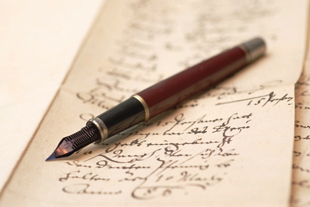 Vintage-ink-pen-and-cursive-writing